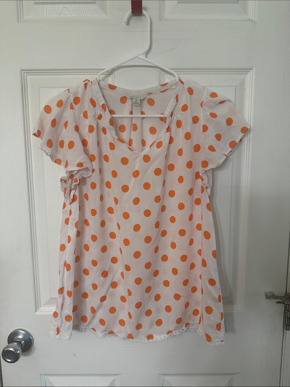Cato White Blouse with Orange Polka Dots and Flutter Sleeves